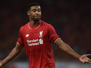 Liverpool's English midfielder Jordon Ibe celebrates after scoring a goal against Malaysia XI during their friendly football match at the Bukit Jalil Stadium in Kuala Lumpur on July 24, 2015.