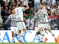 Juventus' forward Alvaro Morata from Spain (R) celebrates with teammate Juventus' defender from Italy Giorgio Chiellini after scoring during the Italian Serie A football match Juventus Vs Bologna on October 4, 2015