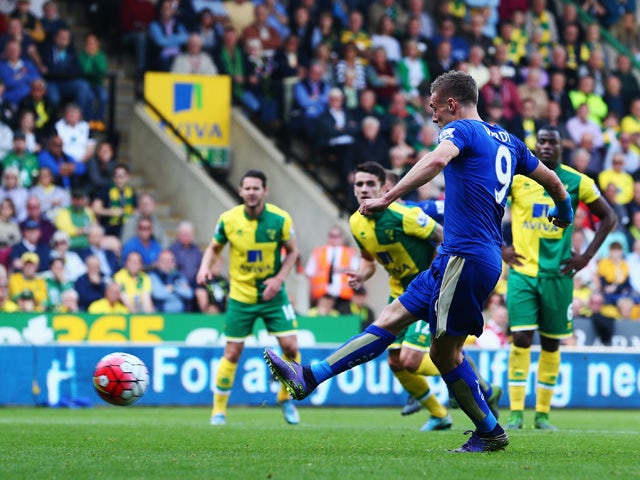 Jamie Vardy of Leicester City scores his team's first goal during the Barclays Premier League match between Norwich City and Leicester City at Carrow Road on October 3, 2015