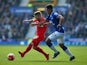 Alberto Moreno of Liverpool is closed down by Tyias Browning of Everton during the Barclays Premier League match between Everton and Liverpool at Goodison Park on October 4, 2015 in Liverpool, England. 