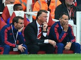 Louis van Gaal manager of Manchester United and Ryan Giggs assistant manager of Manchester United look on during the Barclays Premier League match between Arsenal and Manchester United at Emirates Stadium on October 4, 2015 in London, England.