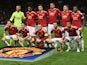 Manchester United's English forward Wayne Rooney (front row C) poses with teammates ahead of the UEFA Champions League Group B football match between Manchester United and VfL Wolfsburg at Old Trafford in Manchester, north west England, on September 30, 2