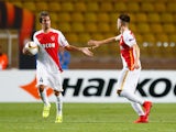 Fabio Coentrao of Monaco congratulates Stephan El Shaarawy of Monaco on scoring their first goal during the UEFA Europa League group J match between AS Monaco FC and Tottenham Hotspur FC at Stade Louis II on October 1, 2015