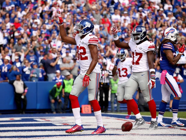 Rueben Randle #82 of the New York Giants celebrates a touchdown against the Buffalo Bills during the first half at Ralph Wilson Stadium on October 4, 2015