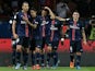 Paris Saint-Germain's Swedish forward Zlatan Ibrahimovic (L) is congratulated by teammates after scoring a penatly during the French L1 football match Paris Saint-Germain (PSG) vs Olympique de Marseille (OM) on October 4, 2015