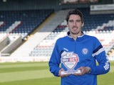 Rochdale's Peter Vincenti poses with the Unsung Hero of the Month award for September 2015