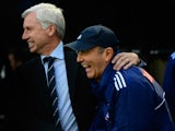 Newcastle manager Alan Pardew (l) shares a joke with Tony Pulis before the Barclays premier league match between Newcastle United and Stoke City at Sports Direct Arena on April 21, 2012 in Newcastle upon Tyne, England.