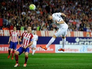 Half-Time Report: Benzema header gives Real Madrid lead