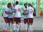 Miralem Pjanic of Roma celebrates with team mates after scoring the opening goal during the Serie A match between US Citta di Palermo and AS Roma at Stadio Renzo Barbera on October 4, 2015 in Palermo, Italy. 