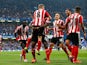 Steven Davis (C) of Southampton celebrates scoring his team's first goal with his team mates during the Barclays Premier League match between Chelsea and Southampton at Stamford Bridge on October 3, 2015 in London, United Kingdom.