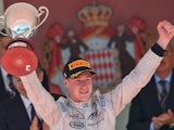 Belgian driver Stoffel Vandoorne holds his trophy as he celebrates after winning the GP2 series race at the Monaco street circuit in Monte-Carlo on May 22, 2015