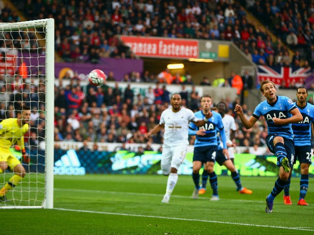 Harry Kane of Tottenham Hotspur scores an own goal during the Barclays Premier League match between Swansea City and Tottenham Hotspur at Emirates Stadium on October 4, 2015 in Swansea, Wales.