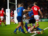Wesley Fofana of France is congratulated by team mates as he scores their first try during the 2015 Rugby World Cup Pool D match between France and Canada at Stadium mk on October 1, 2015