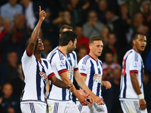 Saido Berahino of West Bromwich Albiat The Hawthorns on (L) celebrates with team mates as he scores their first goal during the Barclays Premier League match between West Bromwich Albiat The Hawthorns on and Evertat The Hawthorns on at The Hawthorns on Se