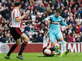 Carl Jenkinson of West Ham United scores his team's first goal during the Barclays Premier League match between Sunderland and West Ham United at the Stadium of Light in Sunderland on October 3, 2015