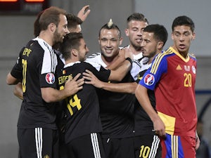 Depoitre scores on debut as Belgium win