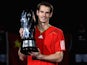 Andy Murray of Great Britain poses for photographers after defeating David Ferrer of Spain during the final of the Shanghai Rolex Masters at the Qi Zhong Tennis Center on October 16, 2011 in Shanghai, China.