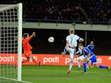 Craig Cathcart of Northern Ireland scores the opening goal during the UEFA EURO 2016 Qualifying match between Finland and Northern Ireland at the Olympic Stadium on October 11, 2015 in Helsinki, Finland.