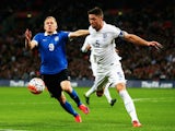 Ats Purje of Estonia and Gary Cahill of England challenge for the ball during the UEFA EURO 2016 Group E qualifying match between England and Estonia at Wembley on October 9, 2015 in London, United Kingdom.