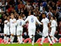Theo Walcott (L) of England celebrates with team mates after scoring during the UEFA EURO 2016 Group E qualifying match between England and Estonia at Wembley on October 9, 2015 in London, United Kingdom. 