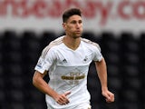 Swansea player Federico Fernandez in action during the Pre season friendly match between Swansea City and Deportivo La Coruna at Liberty Stadium on August 1, 2015