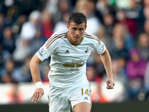 Swansea player Franck Tabanou in action during the Pre season friendly match between Swansea City and Deportivo La Coruna at Liberty Stadium on August 1, 2015