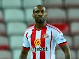 Jermain Defoe of Sunderland leaves the pitch with the match ball after scoring a hat-trick during the Capital One Cup Second Round match between Sunderland and Exeter City at Stadium of Light on August 25, 2015 in Sunderland, England.