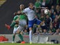 Josh Magennis of Northern Ireland (L) and Vangelis Moras of Greece (R) during the Euro 2016 Group F international football match at Windsor Park on October 8, 2015 in Belfast, Northern Ireland.