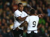 Leone Nakarawa of Fiji (L) celebrates with Nemia Kenatale as he scores their fourth try during the 2015 Rugby World Cup Pool A match between Fiji and Uruguay at Stadium mk on October 6, 2015 in Milton Keynes, United Kingdom.