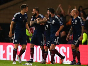 Matt Ritchie of Scotland celebrates with Steven Fletcher of Scotland after he scores during the UEFA EURO 2016 qualifier between Scotland and Poland at Hampden Park on October 08, 2015 in Glasgow, Scotland.