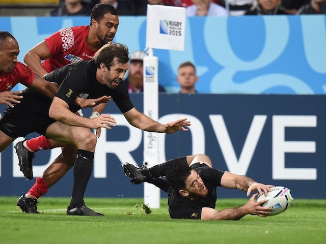 New Zealand winger Nehe Milner-Skuller scores a try during the Rugby World Cup Pool C match against Tonga on October 9, 2015