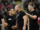 New Zealand's prop Tony Woodcock (2nd R) celebrates with teammates after scoring his team's second try during a Pool C match of the 2015 Rugby World Cup between New Zealand and Tonga at St James' Park in Newcastle-upon-Tyne, northeast England, on October 