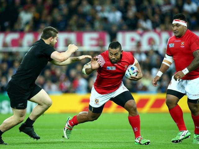 Elvis Taione (C) of Tonga takes on Dane Coles of the New Zealand All Blacks during the 2015 Rugby World Cup Pool C match between New Zealand and Tonga at St James' Park on October 9, 2015 in Newcastle upon Tyne, United Kingdom.
