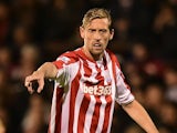Peter Crouch of Stoke City gestures during the Capital One Cup Third Round match between Fulham and Stoke City at Craven Cottage on September 22, 2015 in London, United Kingdom.
