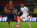 Ricardo Quaresma (R) of Portugal in action against Nemanja Matic (L) of Serbia during the Euro 2016 qualifying football match between Serbia and Portugal at the Stadium FC Partizan in Belgrade on October 11, 2015. 