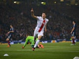 Robert Lewandowski of Poland celebrates after scoring the opening goal during the UEFA EURO 2016 qualifier between Scotland and Poland at Hampden Park on October 08, 2015 in Glasgow, Scotland. 