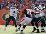 Russell Wilson #3 of the Seattle Seahawks drops back and throws a pass during the second quarter of the game against the Cincinnati Bengals at Paul Brown Stadium on October 11, 2015 in Cincinnati, Ohio.