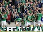 Northern Ireland's midfielder Steven Davis (L) celebrates with teammates after scoring the opening goal during the UEFA Euro 2016 qualifying Group F football match between Northern Ireland and Greece at Windsor Park in Belfast, Northern Ireland, on Octobe