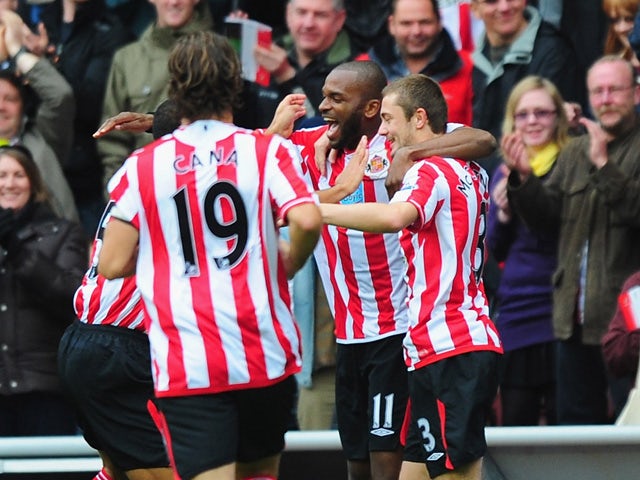 Darren Bent of Sunderland celebrates with team mates after scoring during the Barclays Premier League match between Sunderland and Liverpool at the Stadium of Light on October 17, 2009