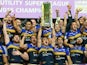 Kevin Sinfield of the Leeds Rhinos celebrates as he holds the trophy aloft with his team mates after the First Utility Super League Grand Final between Wigan Warriors and Leeds Rhinos at Old Trafford on October 10, 2015 in Manchester, England.