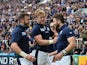 Scotland's wing Tommy Seymour (R) celebrates with teammates after scoring his team's first try during a Pool B match of the 2015 Rugby World Cup between Scotland and Samoa at St James' Park in Newcastle-upon-Tyne, northeast England, on October 10, 2015