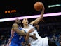 Zach LaVine #8 of the Minnesota Timberwolves shoots the ball as Serge Ibaka #9 of the Oklahoma City Thunder reaches over for a foul during the third quarter of the preseason game on October 7, 2015 at Target Center in Minneapolis, Minnesota. 