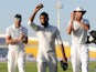 Adil Rashid of England salutes the crowd as he leaves the field after claiming 5 wicket haul during day five of the 1st Test between Pakistan and England at Zayed Cricket Stadium on October 17, 2015