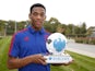 Anthony Martial poses with his Player of the Month award for September 2015