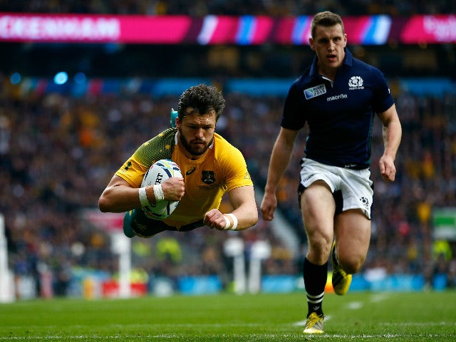 Adam Ashley-Cooper of Australia scores his teams opening try during the 2015 Rugby World Cup Quarter Final match between Australia and Scotland at Twickenham Stadium on October 18, 2015 in London, United Kingdom.