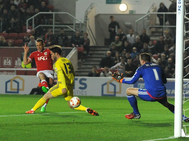 Aaron Wilbraham of Bristol City scores his sides first goal during the Sky Bet Championship match between Bristol City and Nottingham Forest at Ashton Gate on October 16, 2015 in Bristol, England.