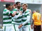 Nadir Ciftci of Celtic celebrates scoring with Stuart Armstrong of Celtic during the Ladbrokes Scottish Premiership match between Motherwell and Celtic at Fir Park on October 17, 2015