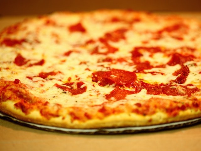 A delicious slice of cheese and pepperoni pizza - mmm!