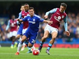 Jack Grealish of Aston Villa and Cesar Azpilicueta of Chelsea compete for the ball during the Barclays Premier League match between Chelsea and Aston Villa at Stamford Bridge on October 17, 2015