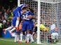 Chelsea players celebrate their team's first goal by Diego Costa (obscured) during the Barclays Premier League match between Chelsea and Aston Villa at Stamford Bridge on October 17, 2015